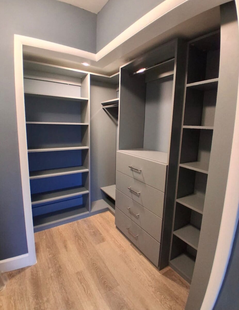 Corner pantry cabinetry with drawers and open shelving