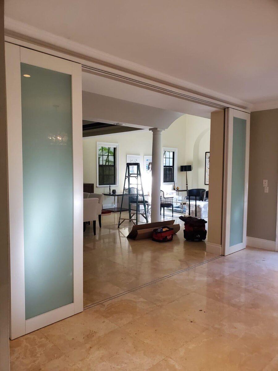 Frosted glass sliding room divider panels